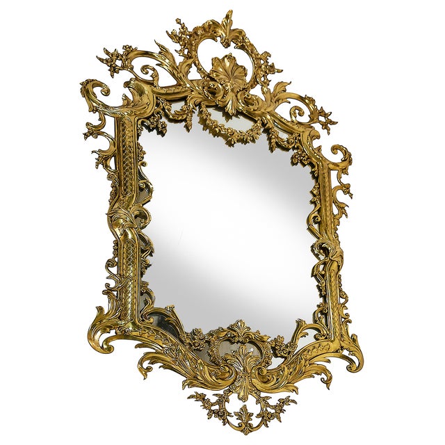 Vintage Large French Brass Wall Mirror from 1960-70'. Created with richly decorative elements in Rococo style. Very solid...