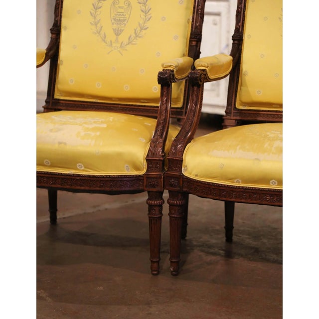French Pair of 19th Century French Louis XVI Walnut Fauteuils With Eagle Crest For Sale - Image 3 of 10
