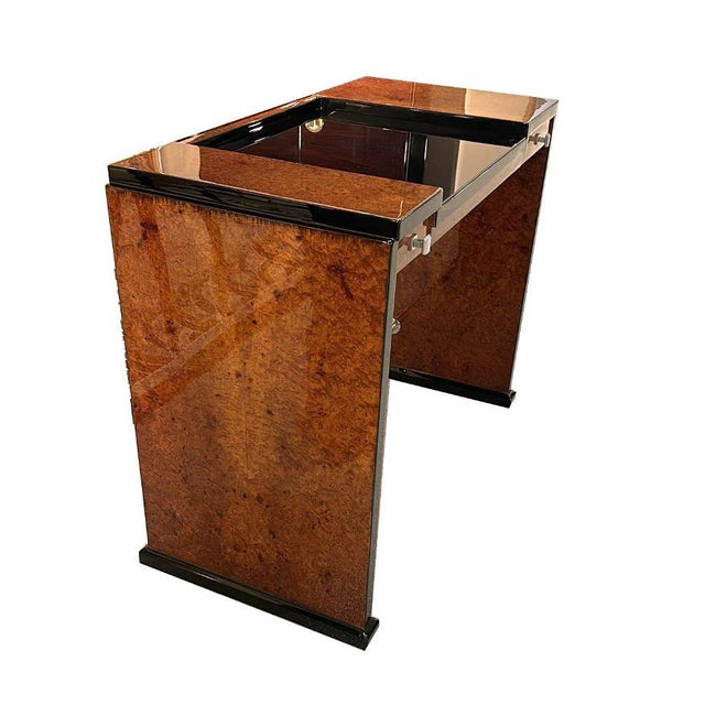 Delicate Art Deco desk France around 1925. Amboina wood and black lacquer. Two drawers - chrome bar. Original fittings....