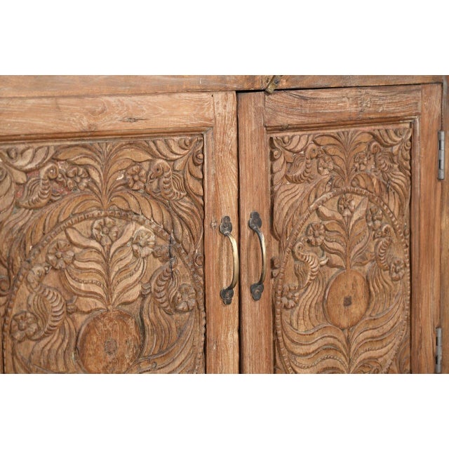 This Cabinet/Buffet constructed from Antique Indian Carved Door Panels and Reclaimed Wood features hand-carved antique...