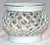 Reticulated pot bellied white porcelain catchall bowl with 23k gold decoration by BloomRite. Some slight age, gold wear.