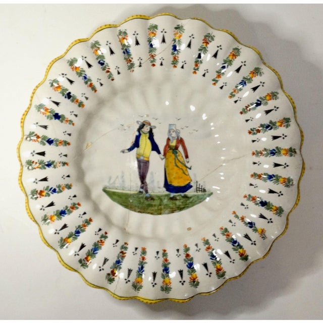 Lovely 18th-Century large French Quimper lobed charger that a collector world love. The plate is handcrafted faience with...
