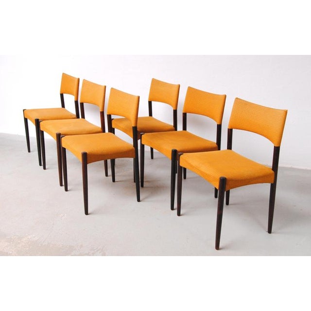 Set of Six Danish rosewood Ejnar Larsen and Axel Bender Madsen dining chairs by Willy Beck The dining chairs feature a...