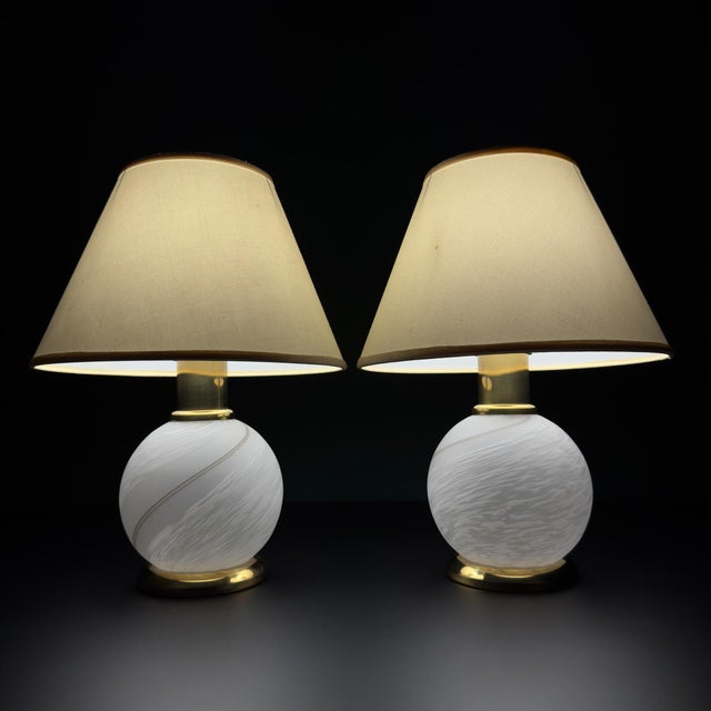 Classic of italian design — pair of swirl table lamps. Made of murano glass in the 1970s. Original vintage handcrafted...