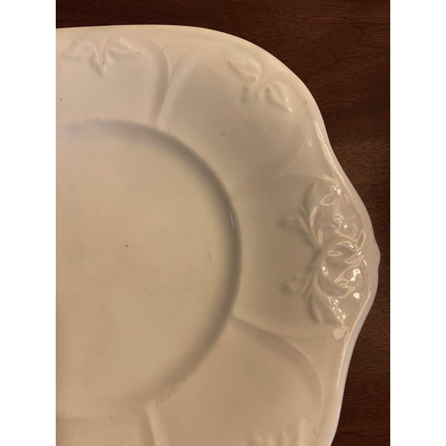 Antique white ironstone serving plate, possibly for cookies, small sandwiches & cakes for tea. Maker's mark is an anchor...