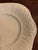 Antique white ironstone serving plate, possibly for cookies, small sandwiches & cakes for tea. Maker's mark is an anchor...