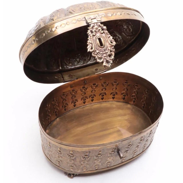 Large, hand hammered brass box that is an absolute eye catcher! The size grabs your attention and then you see the...