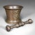 This is an antique Tudor Rose mortar and pestle. An English, bronze apothecary instrument, dating to the mid 17th century,...