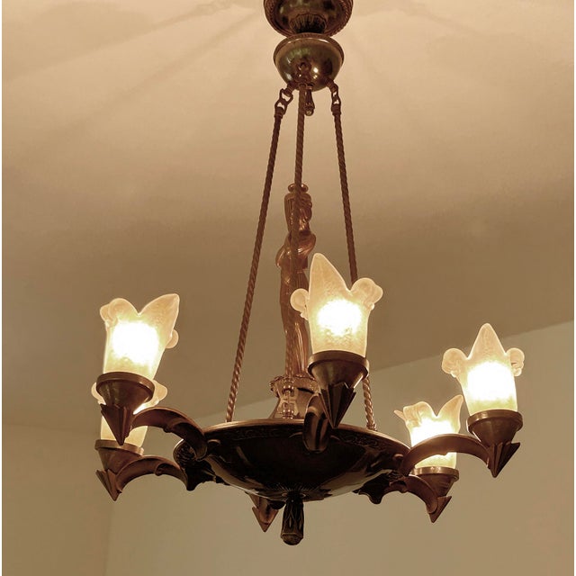 Exceptionnal Art Deco pendant light from the 1920s, fully rewired, featuring a burnished bronze and gun metal color brass...
