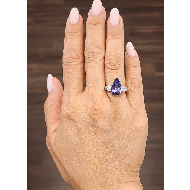This GIA-certified sapphire and diamond cocktail ring is a bold statement of modern luxury. The deep blue of the...