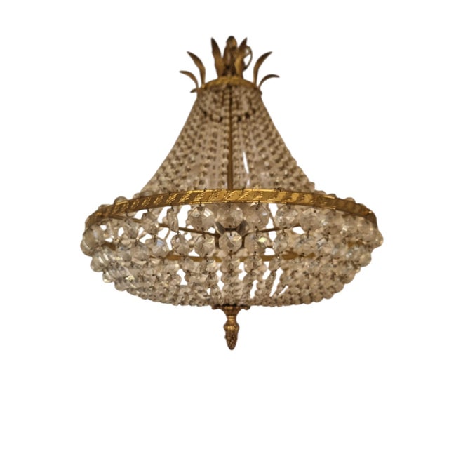 This exceptional, large-scale empire chandelier is a true masterpiece of european craftsmanship from the height of empire...