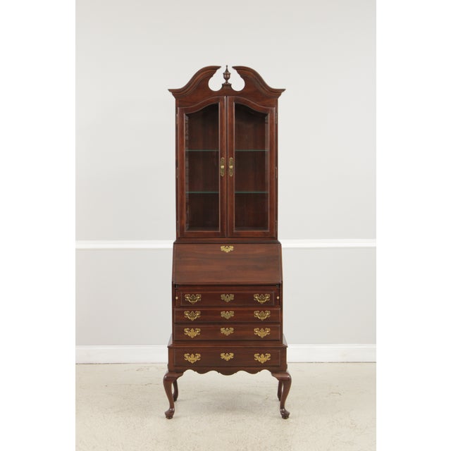 Age: C.1994 Details: Solid Cherry Adjustable Shelves Beveled Glass Dovetailed Drawer Construction Fine Carved Details High...