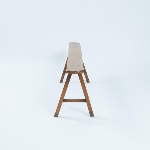 This charming French slim bench dates back to the early 20th century. This French farmhouse bench is crafted from oak and...