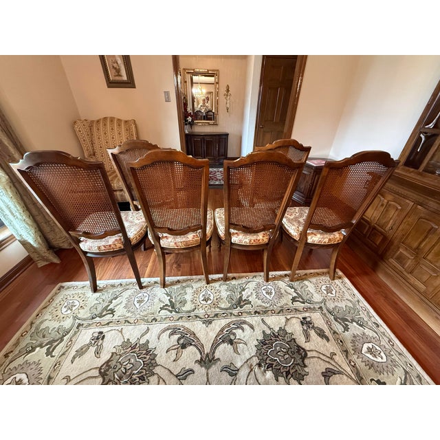 Set of 6 cane back dining chairs from the Ethan Allen Classic Manor Collection. They are made of solid maple with cane...