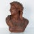 From France, late 19th century, this red painted plaster bust was originally placed in an architectural niche. Depicting a...