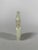 SMALL WHITE NEPHRITE JADE GU VASE, China, Qing Dynasty, Qianlong Period (1736-1795). Finely carved with two taotie masks...