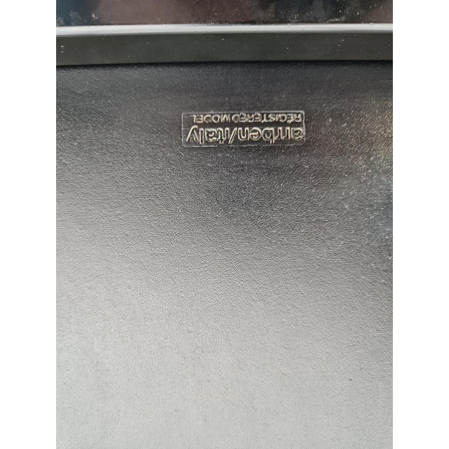 Vintage dining chairs with armrests by Arrben Italy. Black leather seat and backrests, black wooden armrests and metal...