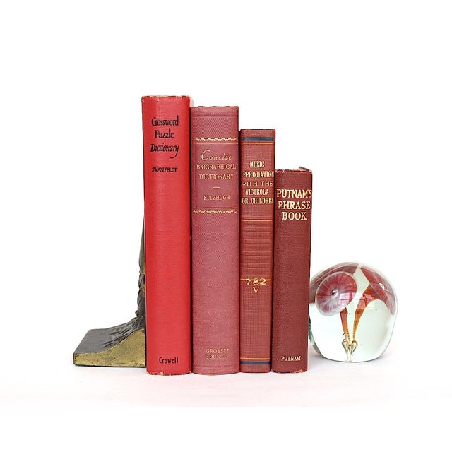 This vintage book set includes a smart selection of old reference books. The decorative red books can be used as a wedding...