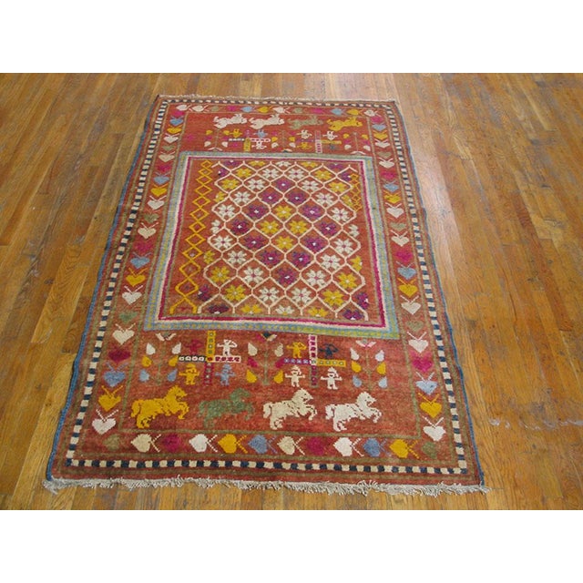 Antique Indian Agra rug, measures: 4'2" x 6'10". Antique Agra Indian Brown 1900s Rug, Circa Date: 1900s. This exceptional...