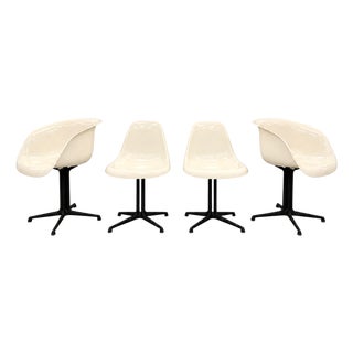 Mid Century Eames for Herman Miller “La Fonda” Parchment Fiberglass Arm & Side Chairs - Set of 4 For Sale