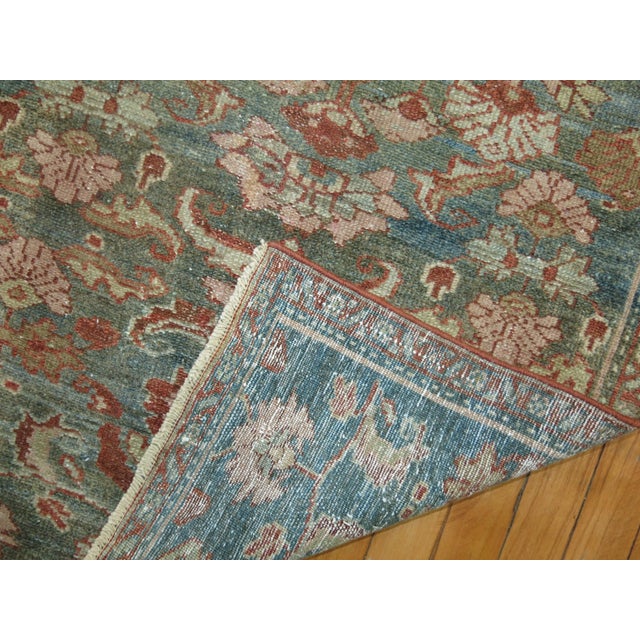 Predominant soft gray-blue-green Persian Malayer runner from the early 20th century. accents in brown and copper Measures:...