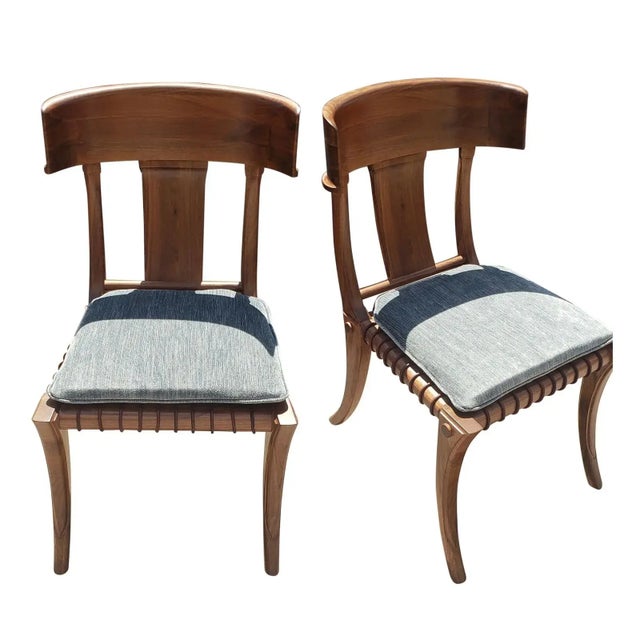 Solid walnut chairs. Modern Klismos dining chairs with upholstered seats cushions. The Robsjohn Gibbings style Klismos...