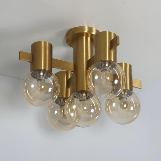Hans agne jakobsson 2158/5 ab markaryd 5-light ceiling lamp from the 1970s, executed in brass with glass globes that...