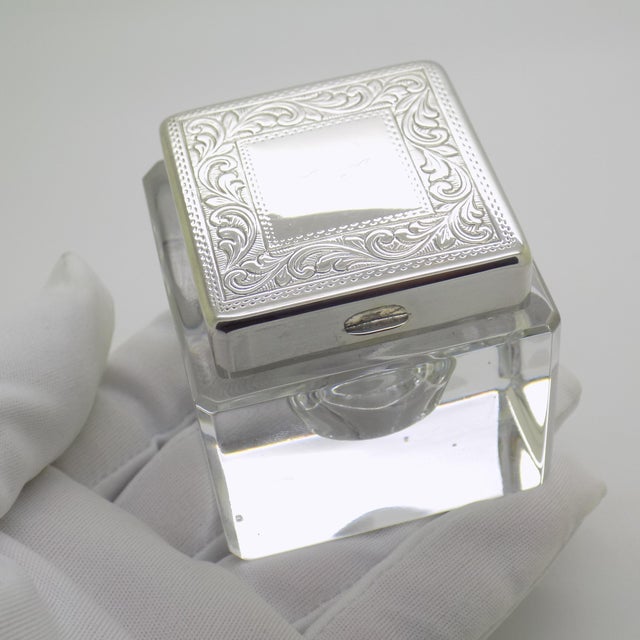 Vintage writing desk set comprising a glass inkwell with a solid silver top and a matching square solid silver tray,...