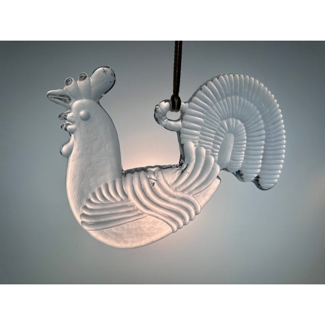 This iconic vintage glass object (suncatcher/window ornament) made of pressed, heavy crystal glass was designed in the...