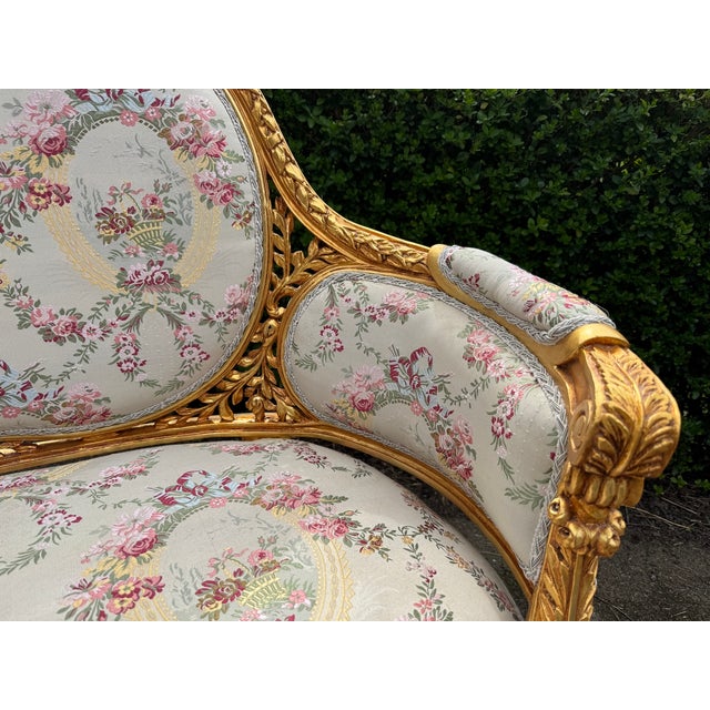 Bring refined French elegance into your interior with this beautiful Louis XVI corbeille settee, crafted circa 1970. With...