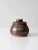 This is a vintage studio pottery jar. Signed by the artist, the hand-crafted jar features a deep brown glaze. It has an...