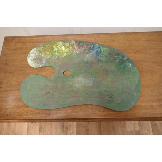 A Used Artists Pallet an Interesting decorative piece The Pallet is made in hard wood and is showing signs of its previous...