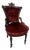 Antique Victorian-Style Parlor Chair Featuring Rich Red Velvet Tufted Upholstery For Sale