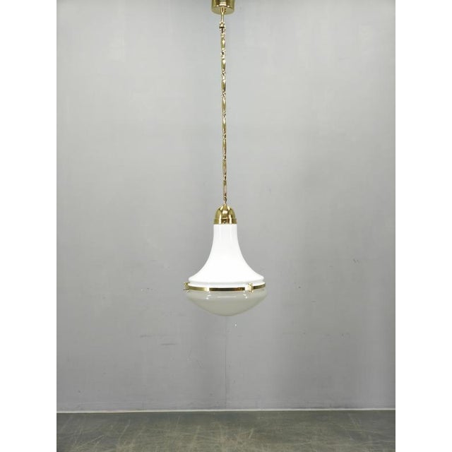 Exceptional art deco pendant lamp designed by peter behrens for siemens in germany during the 1930s. This highly...