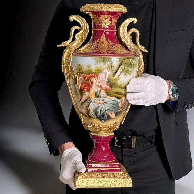 Bring timeless elegance into your home with this stunning vintage porcelain vase by Retier, featuring exquisite hand-...