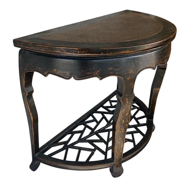 Antique Chinese Chinoiserie distressed black lacquer demi-lune console table, featuring a decorative "cracked Ice" lower...