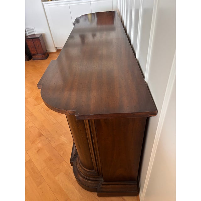 Elevate your dining space with this exceptional buffet from the prestigious Drexel Heritage 'Grand Tour' collection....