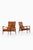 This rare pair of easy chairs, model örenäs, was designed by danish architect and furniture designer ib kofod-larsen and...