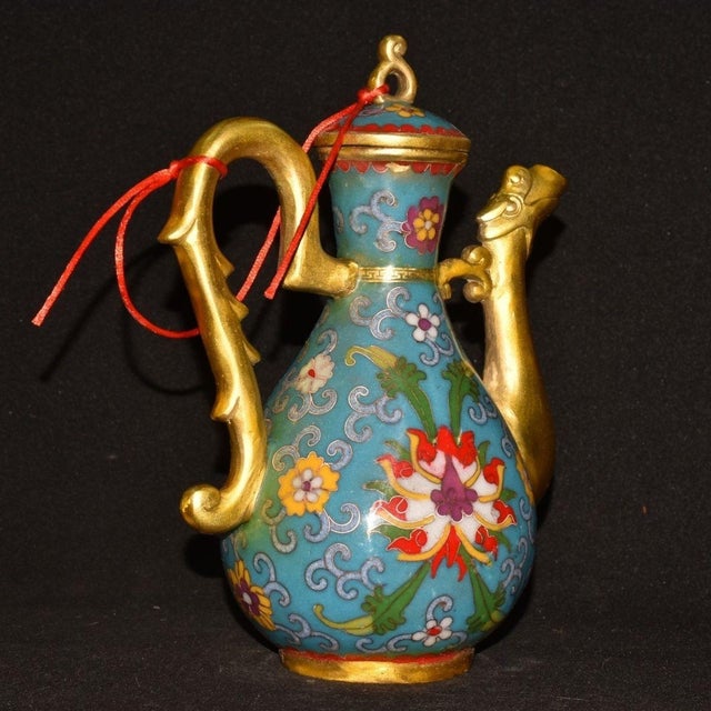 This is a finely crafted antique cloisonné enamel ewer or wine pot, featuring a pear-shaped body and a tall, flaring neck....
