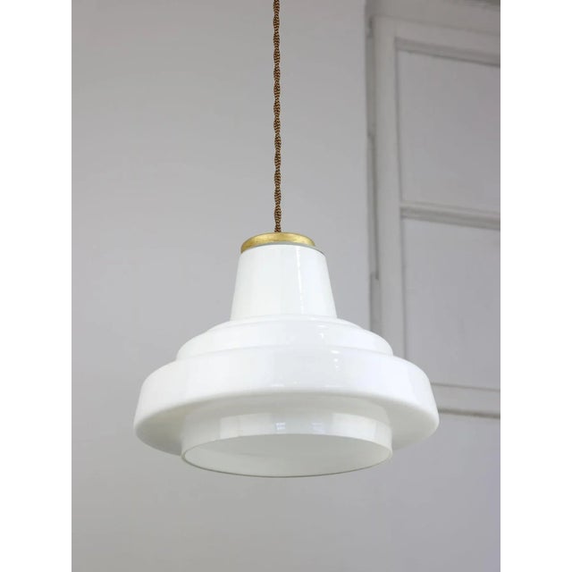 Rewired with a vintage looking textile cable in copper colour (100cm). Takes one standard E27 light bulb. Good overall...