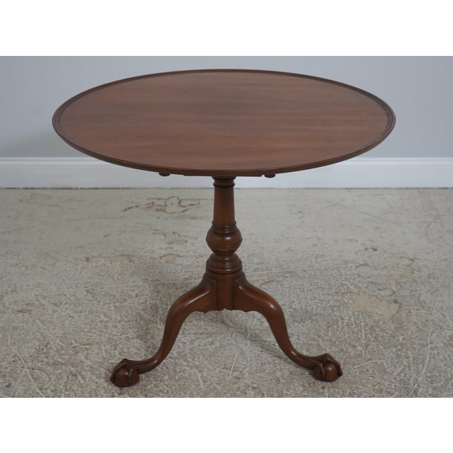 Age: Approx: 40 Years Old Details: Light Mahogany Finish High Quality Construction The claw and ball feet terminating the...