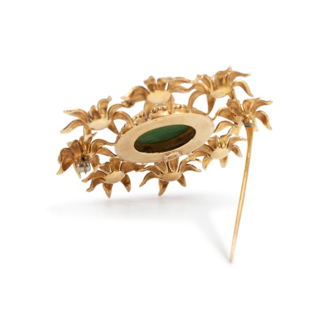 Metal Type: 18K Yellow Gold Diameter: 2.00 inches Weight: 18.36 grams One 18K yellow gold flower pearl and nephrite...