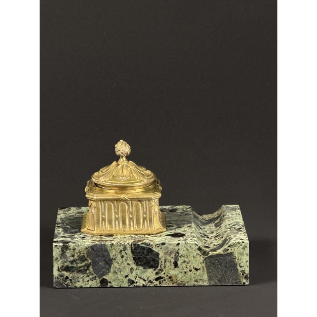 An elegant French Art Nouveau inkwell signed Louchet, Paris, combining finely cast gilt bronze with a richly patterned...