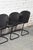 Vintage dining room chairs by Gastone Rinaldi for Thema, Italy. Set consists of 4 chairs with black metal frames and...