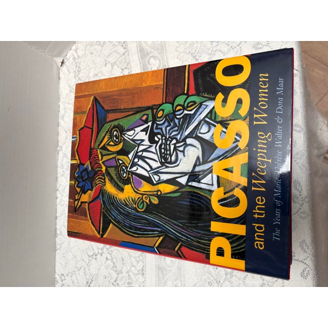 Vintage set of four large hardback art books filled with photos and historical information from the Impressionist era....
