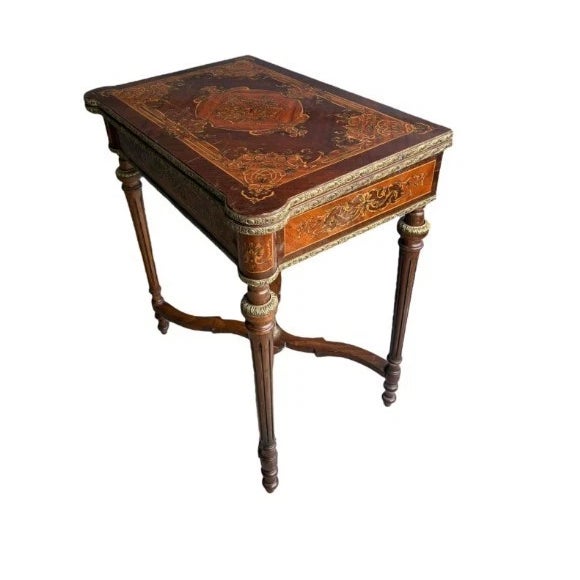 This exquisite Louis XVI-style French game table, dating from the late 19th century, is a superb example of the artistry...