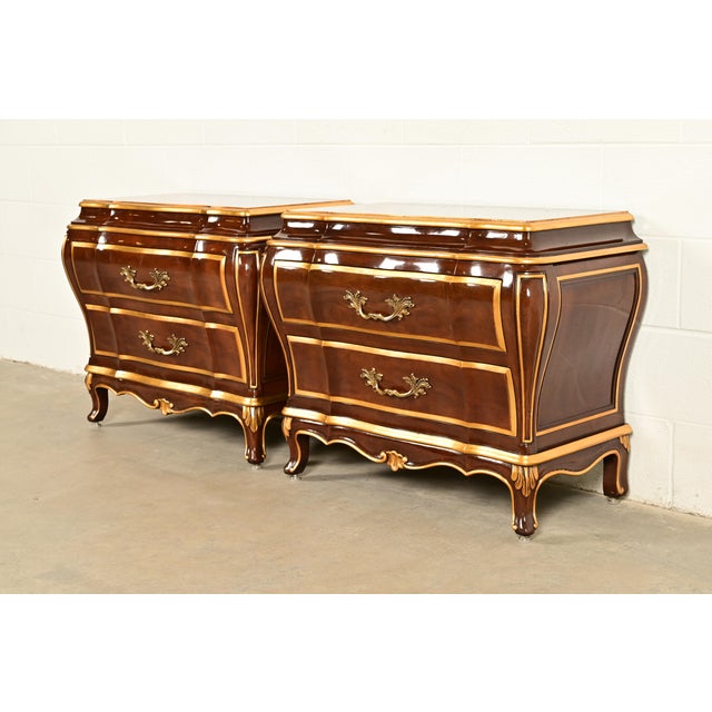 A beautiful pair of French Provincial Louis XV or French Rococo style bombay form chests of drawers, commodes, or bedside...