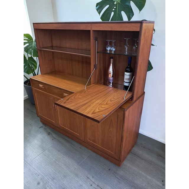 G plan fresco mid-century high board / drinks cabinet by victor wilkins (1970s) in exceptional condition a striking teak...