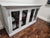Credenza Sideboard Bookcase vintage! Wood painted distressed look. Coastal. Unknown brand. 61W X 35H X 21D. Glass front...