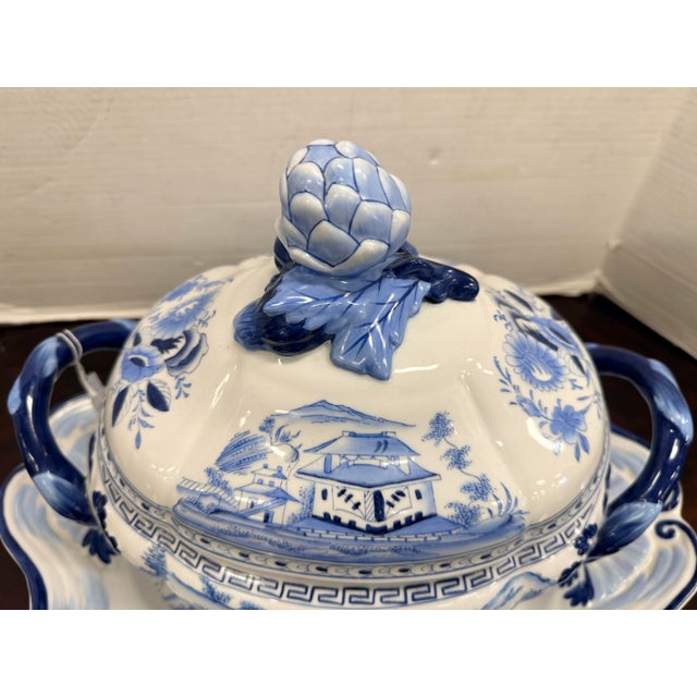 This stunning Chelsea House tureen and underplate showcase classic blue-and-white Chinoiserie porcelain, featuring...
